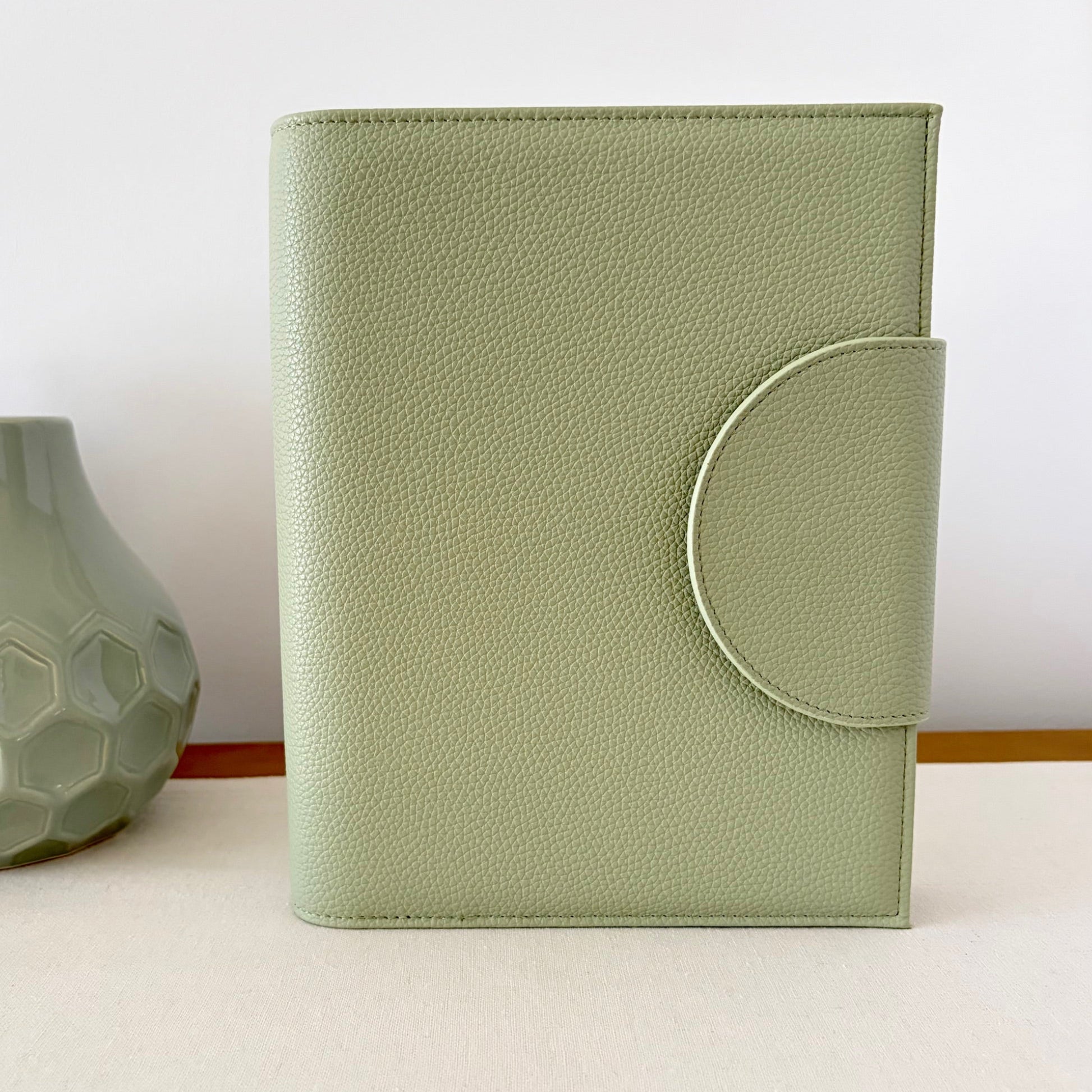 sage green binder front 