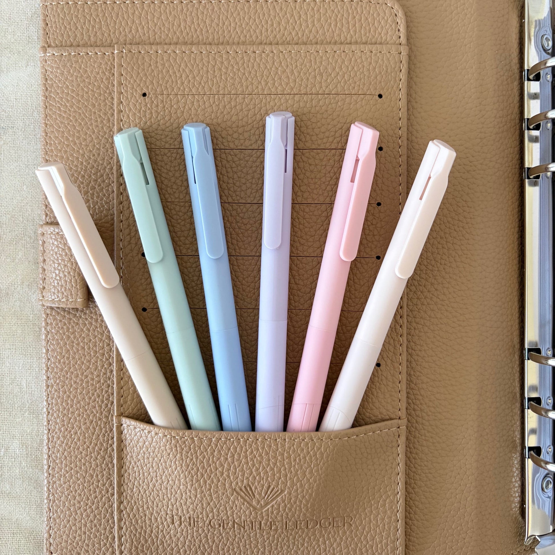 binder with 6 pastel coloured pens