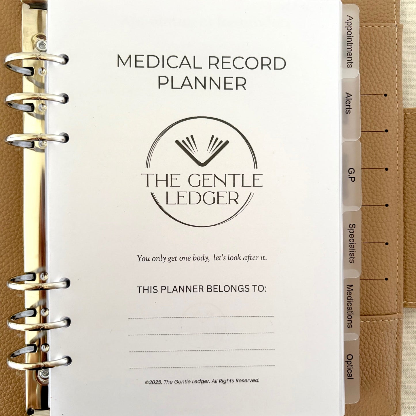 Medical record planner with 'The Gentle Ledger' branding on a beige background